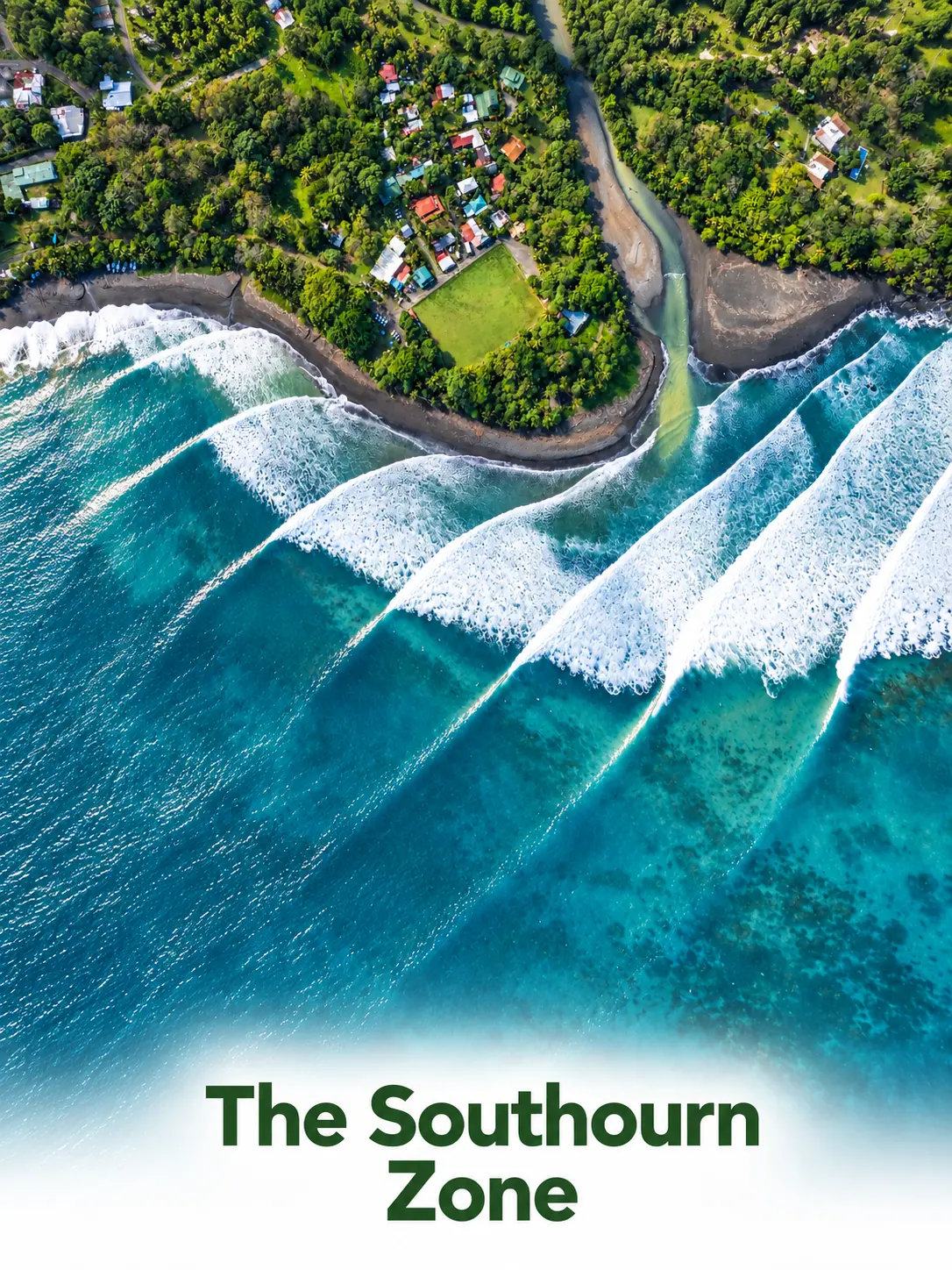 Aerial view of a coastal village and breaking waves in the Southern Zone